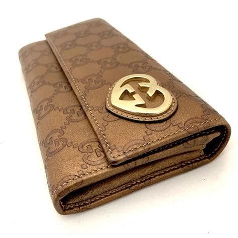 gucci long wallet singapore.